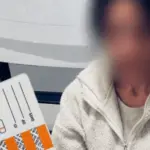 Автомобіль Renault Megane на проспекті Коцюбинського у Вінниці; жінка-водій під час огляду поліціянтами